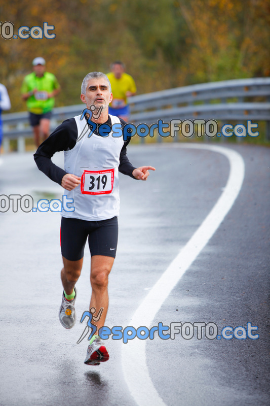 Esport Foto - Esportfoto .CAT - Fotos de XXXV Campionat Internacional d'Atletisme de Fons del Ripollès  (Mitja Marató) - Dorsal [319] -   1384714917_02514.jpg