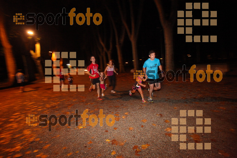 Esport Foto - Esportfoto .CAT - Fotos de La Cocollona night run Girona 2014 - 5 / 10 km - Dorsal [949] -   1409508083_17898.jpg